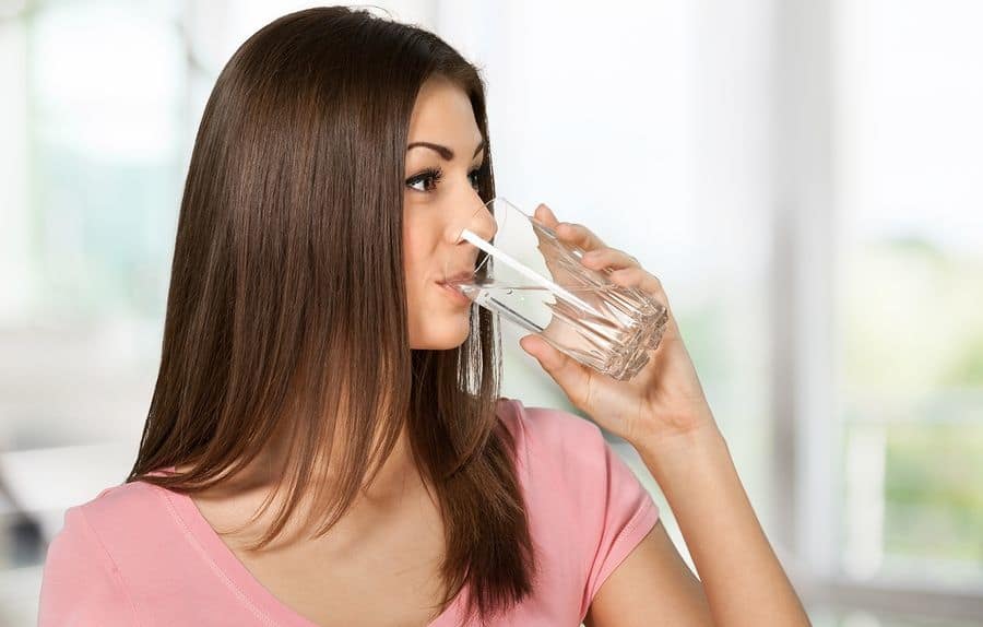 A woman drinking water