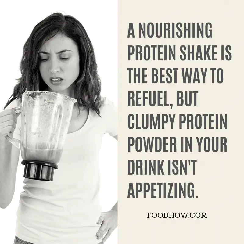 Woman holding a blender cup with a clumpy protein shake 