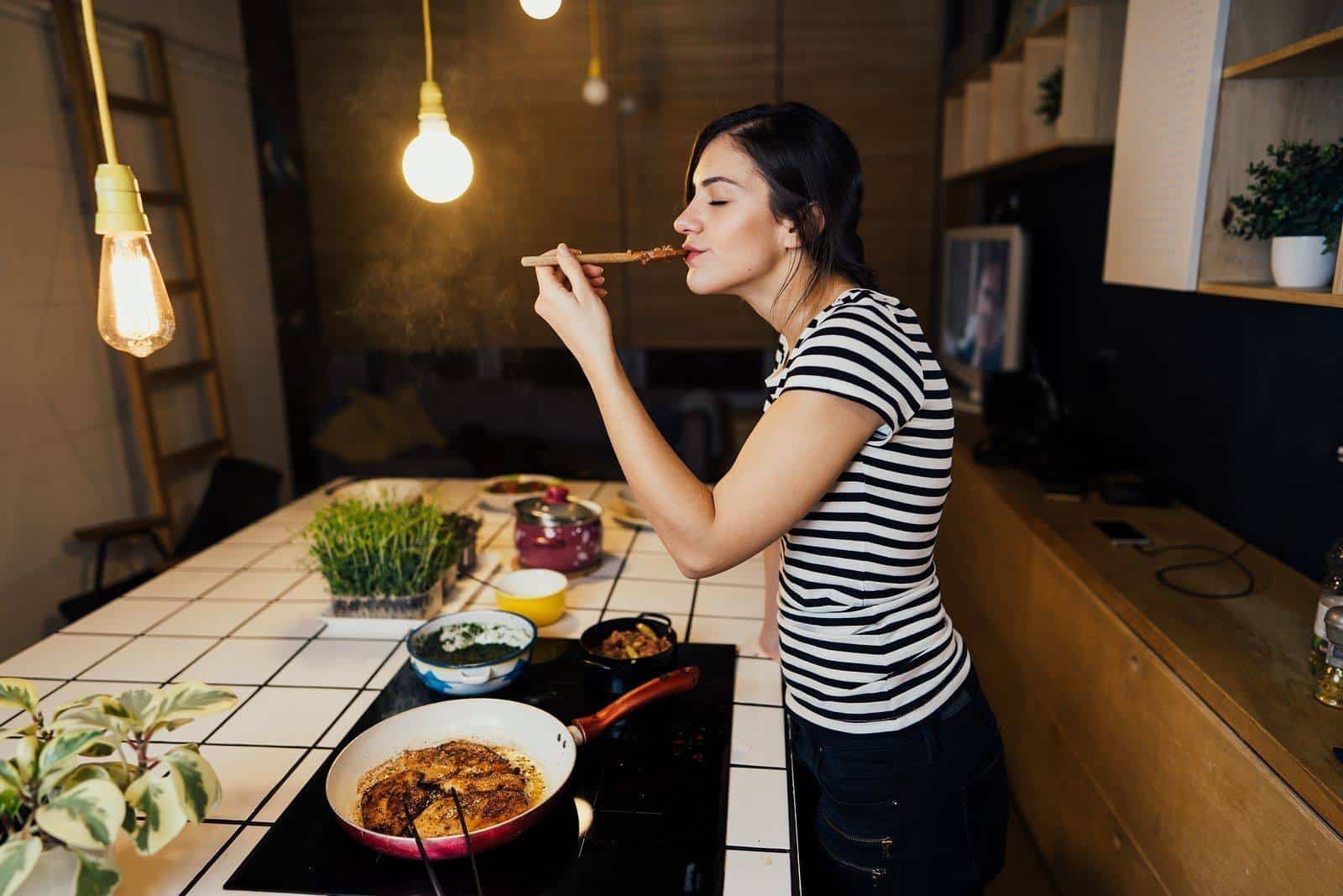 A woman learning to cook