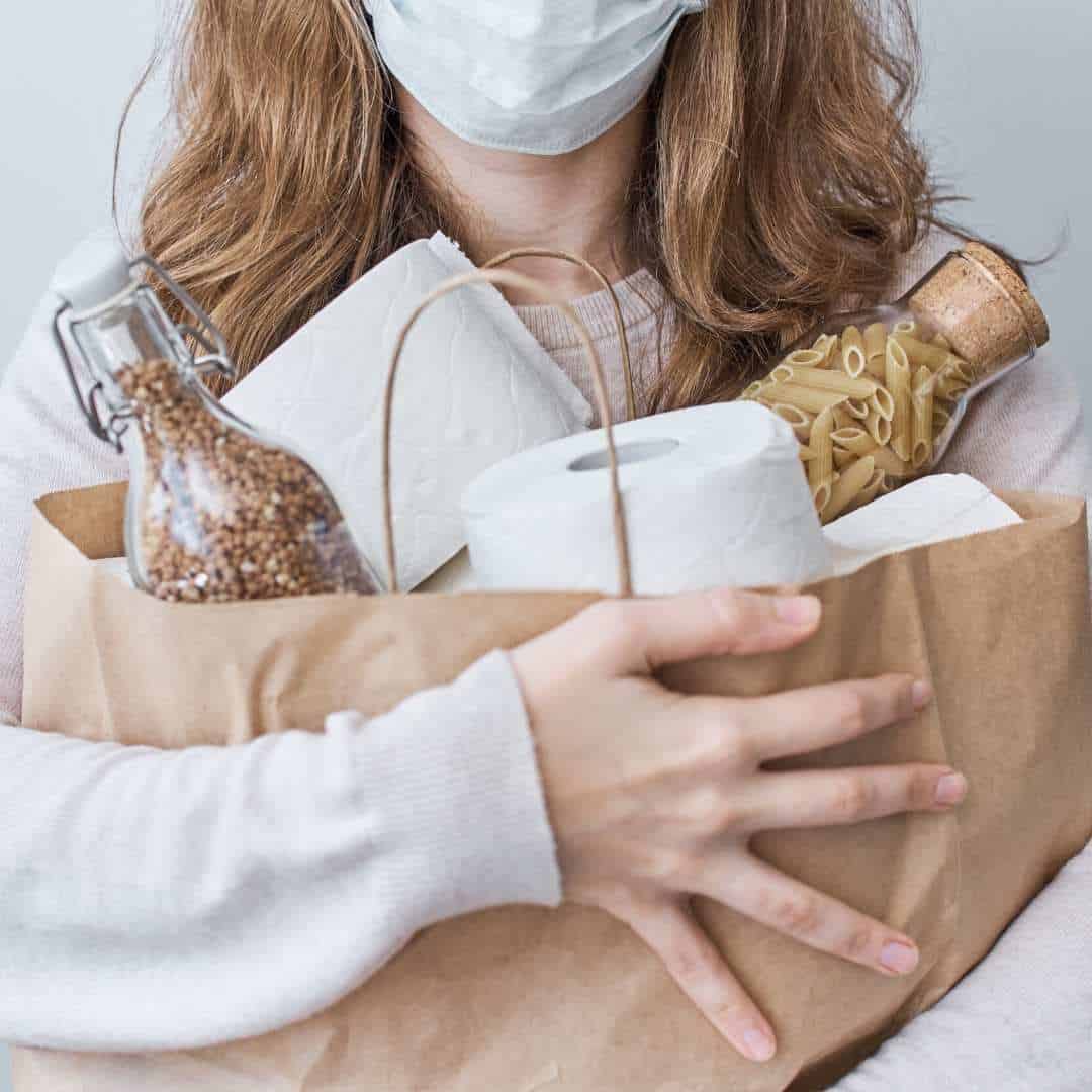 a woman stocking up on food