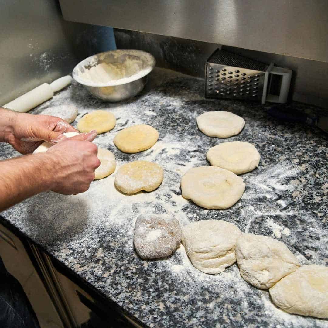 preparing pizza dough for freezing