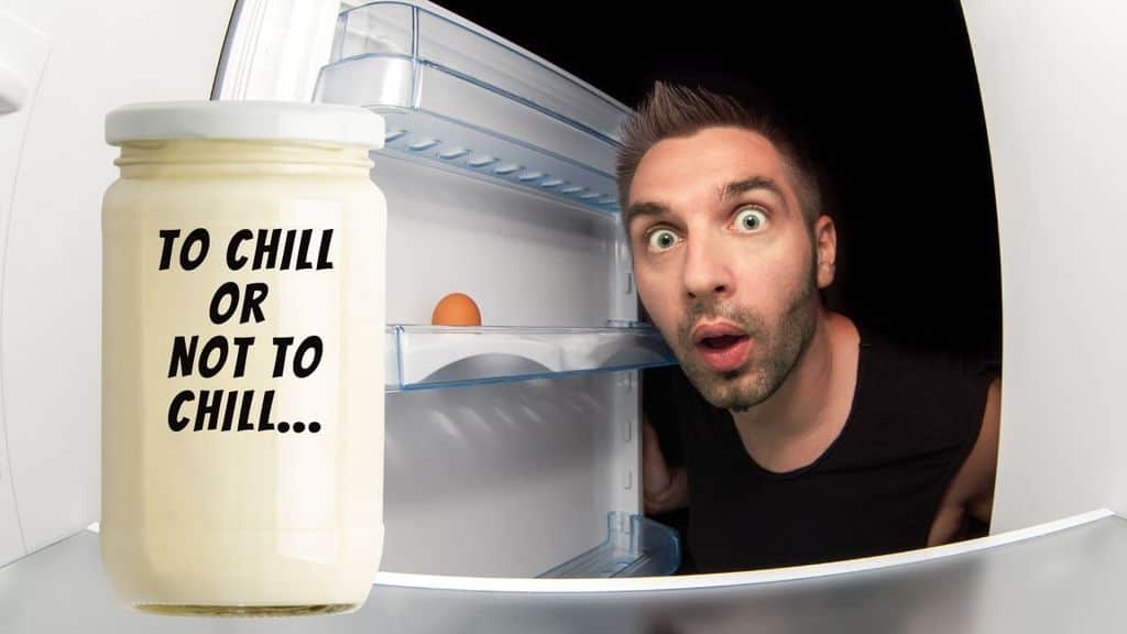 a glass jar of mayo in the fridge