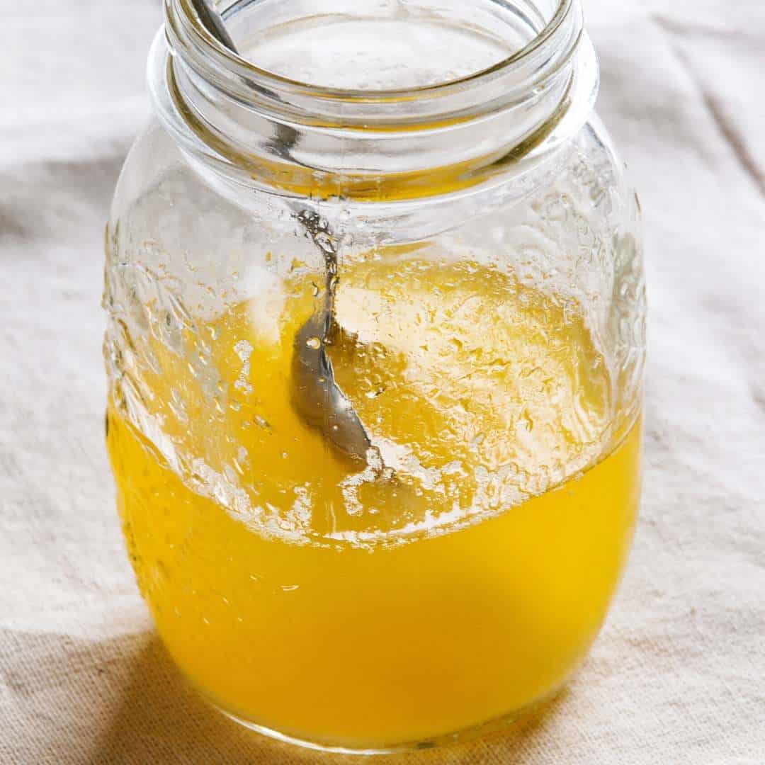 melted clear butterfat in the jar