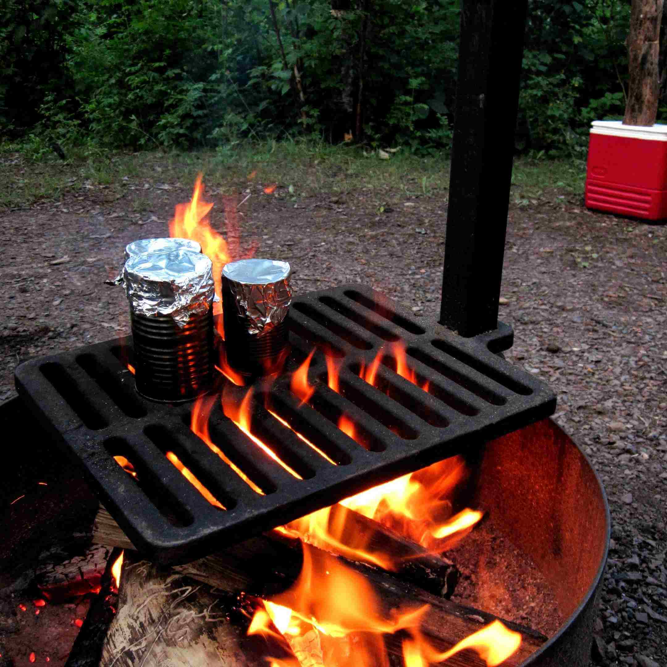 heating canned food on the fire