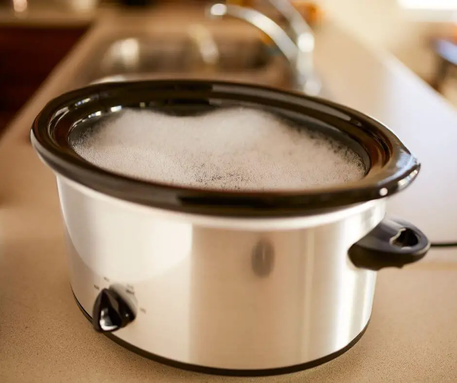 scrubbing washing crockpot