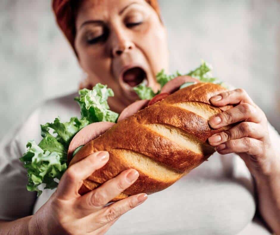 a woman with low leptin levels overeating 