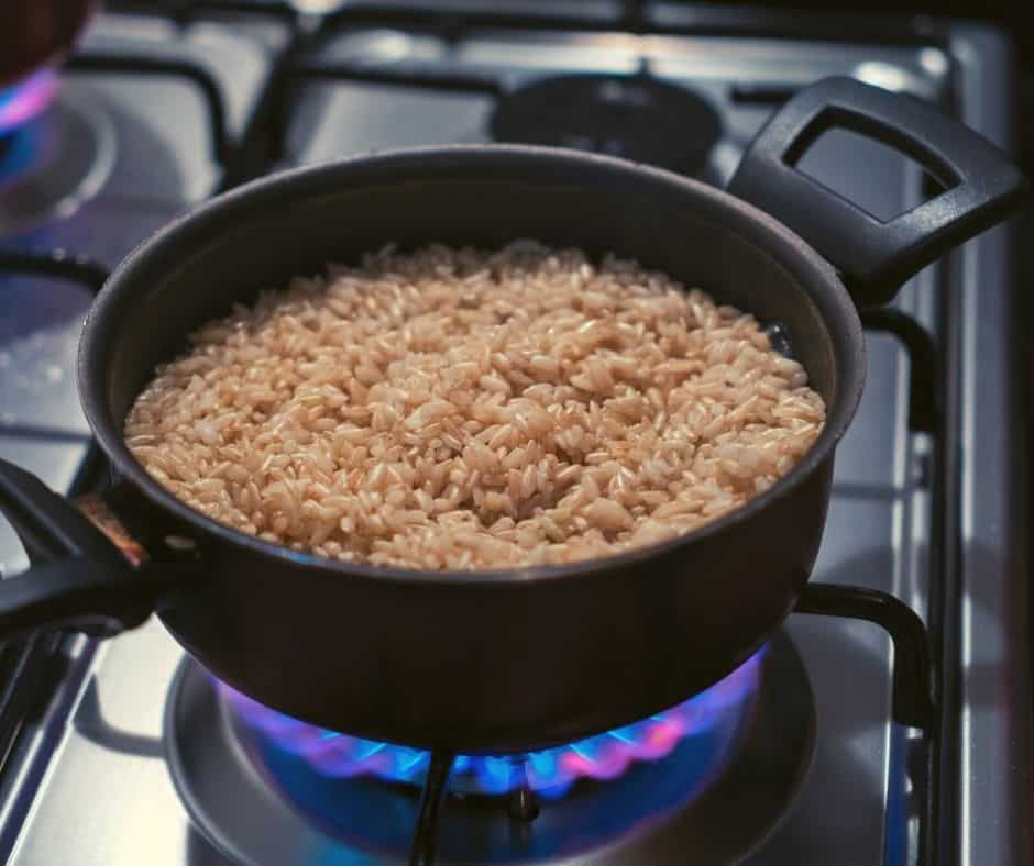 cooking rice in a pot