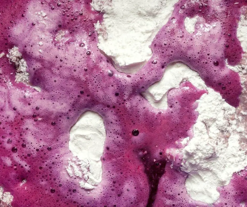 adding red cabbage juice to cake mix