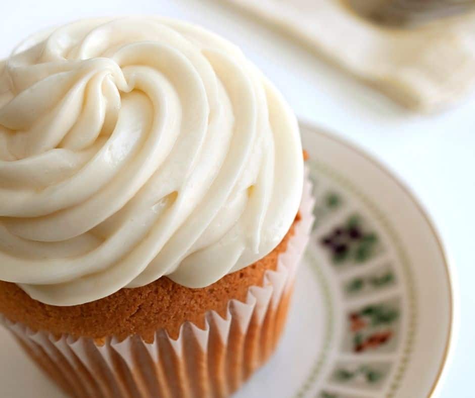 cupcake with cream cheese frosting on top