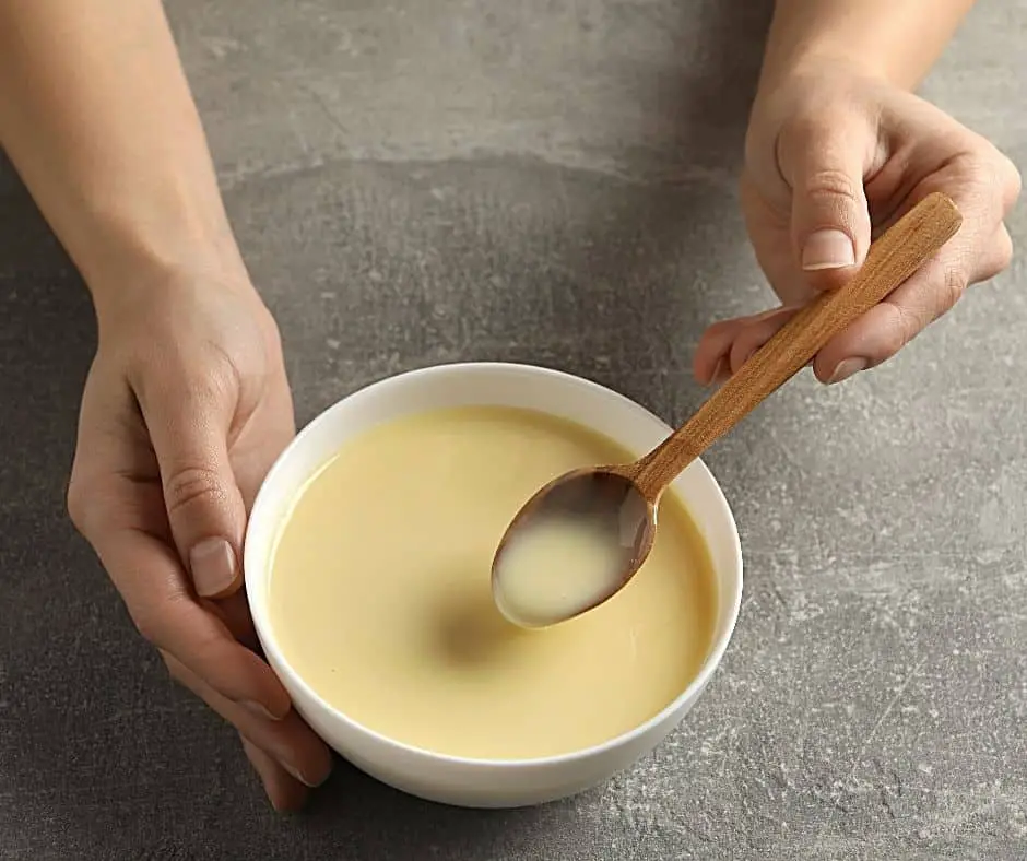 microwaving a bowl of condensed milk