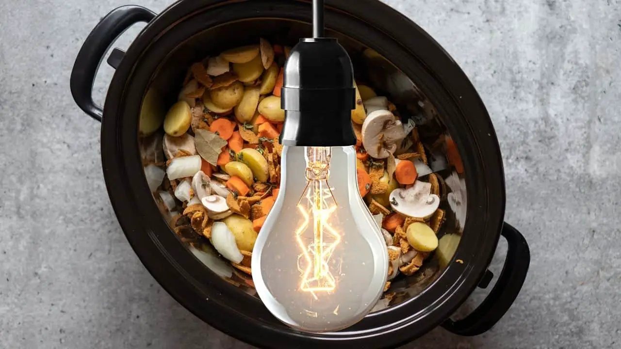 slow cooker energy consumption compared light bulb
