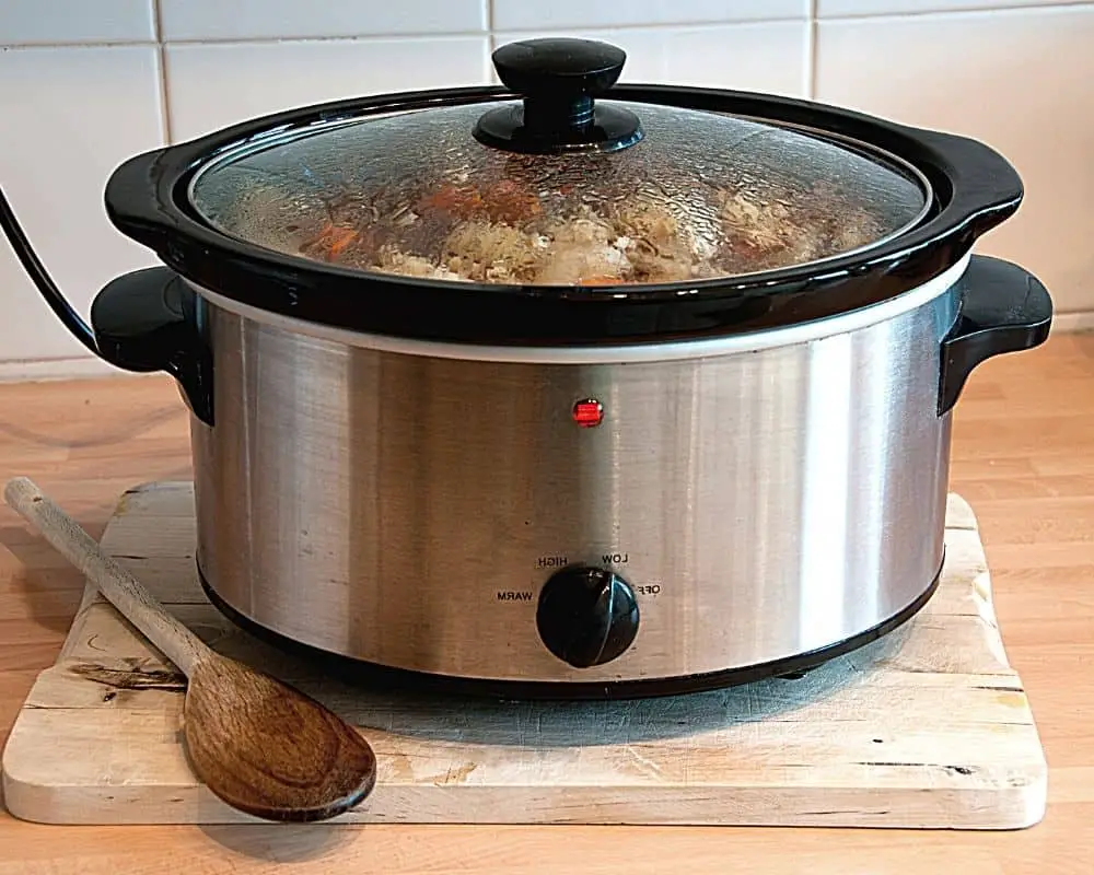 slow cooker plugged in and in use