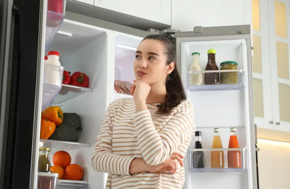 arranging fridge door at home