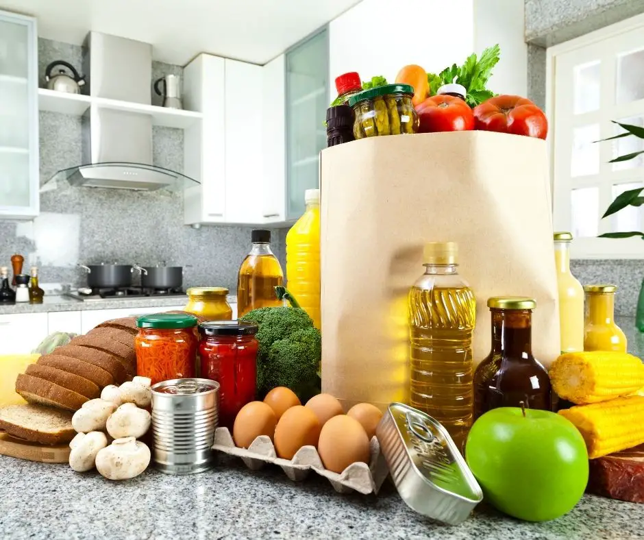 bags of groceries in the kitchen