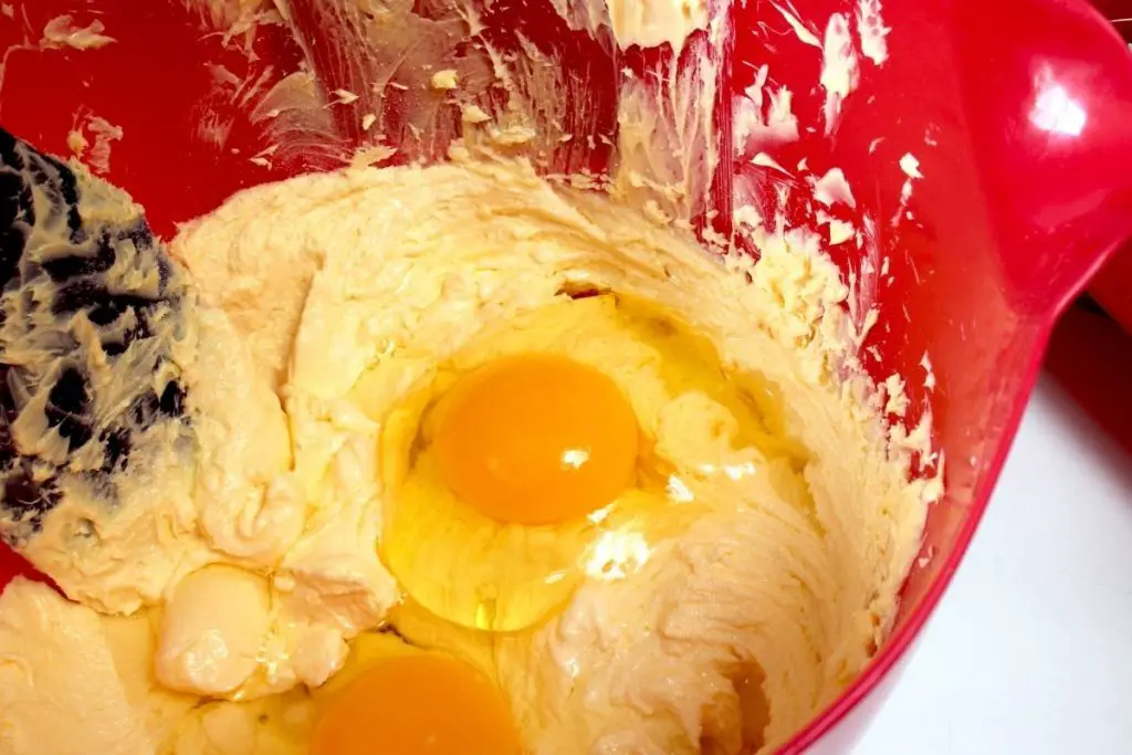 adding an extra egg to make cake mix better