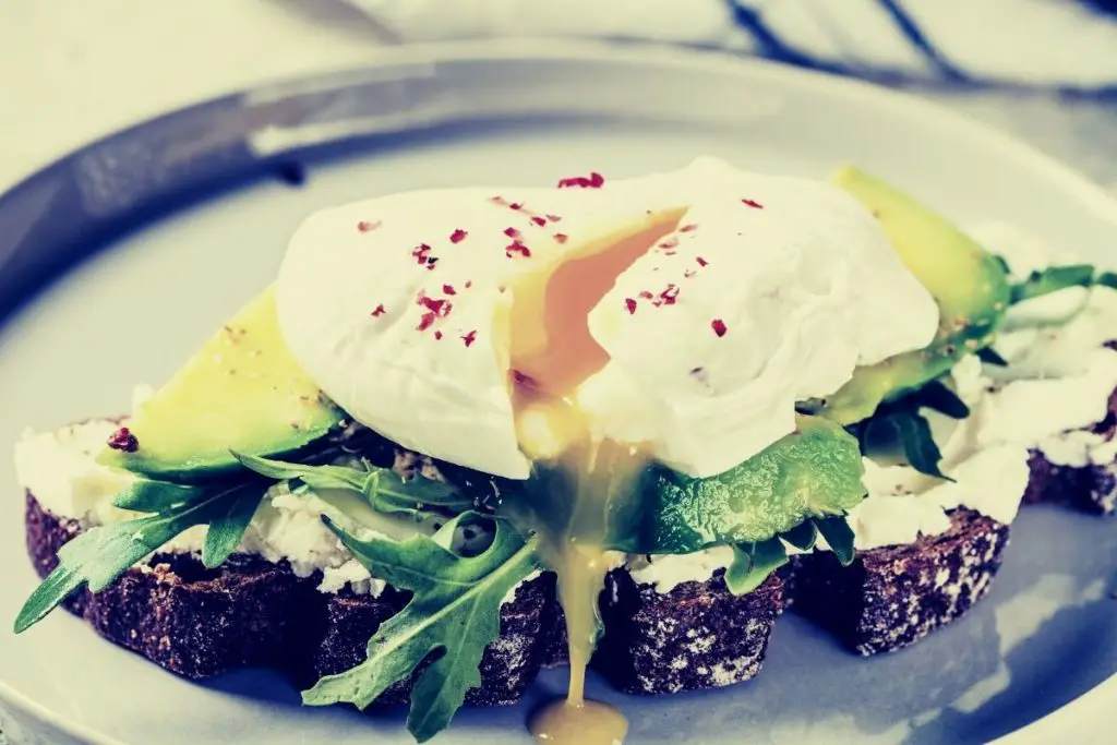 avocado poached egg on rye toast