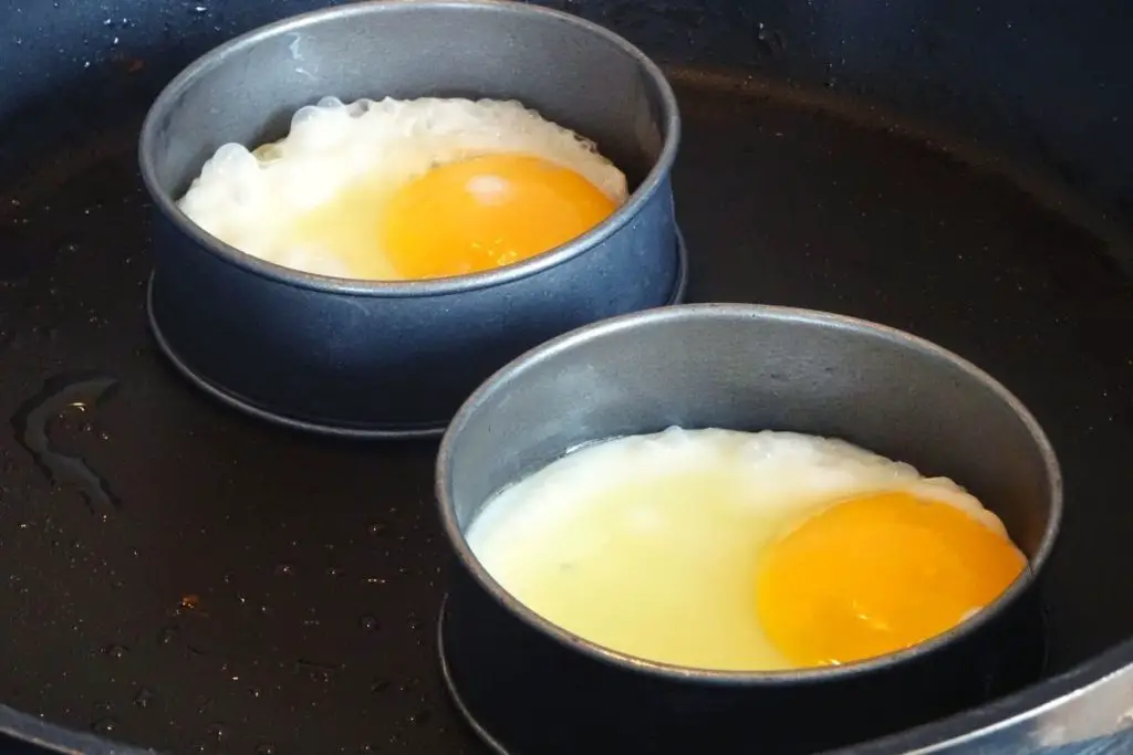 making egg patties with mold