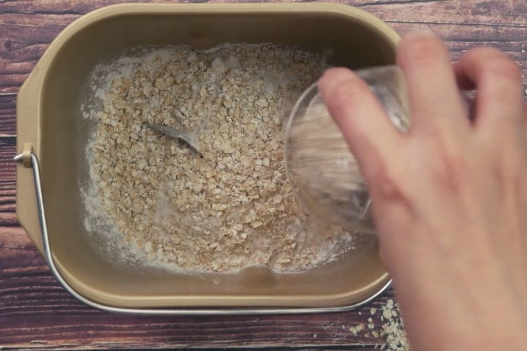 adding ingredients to the bread machine