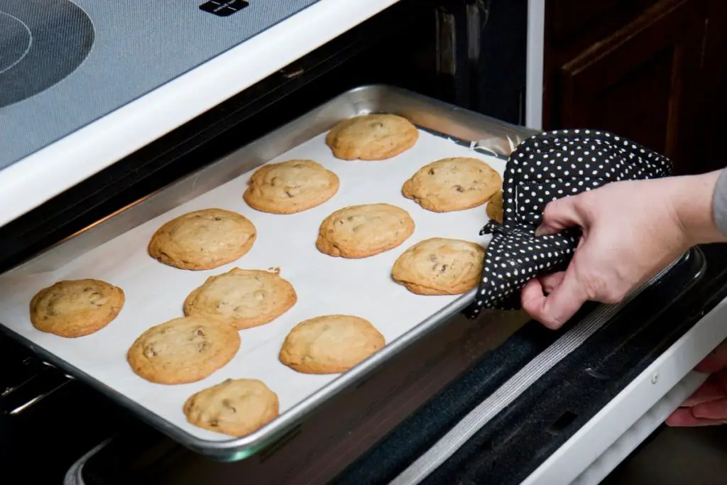 baking cookies in a preheated oven,