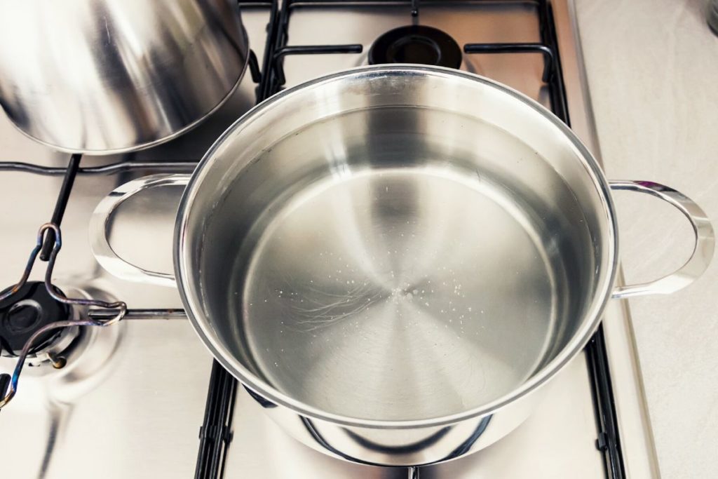 pot full of water on a stove top