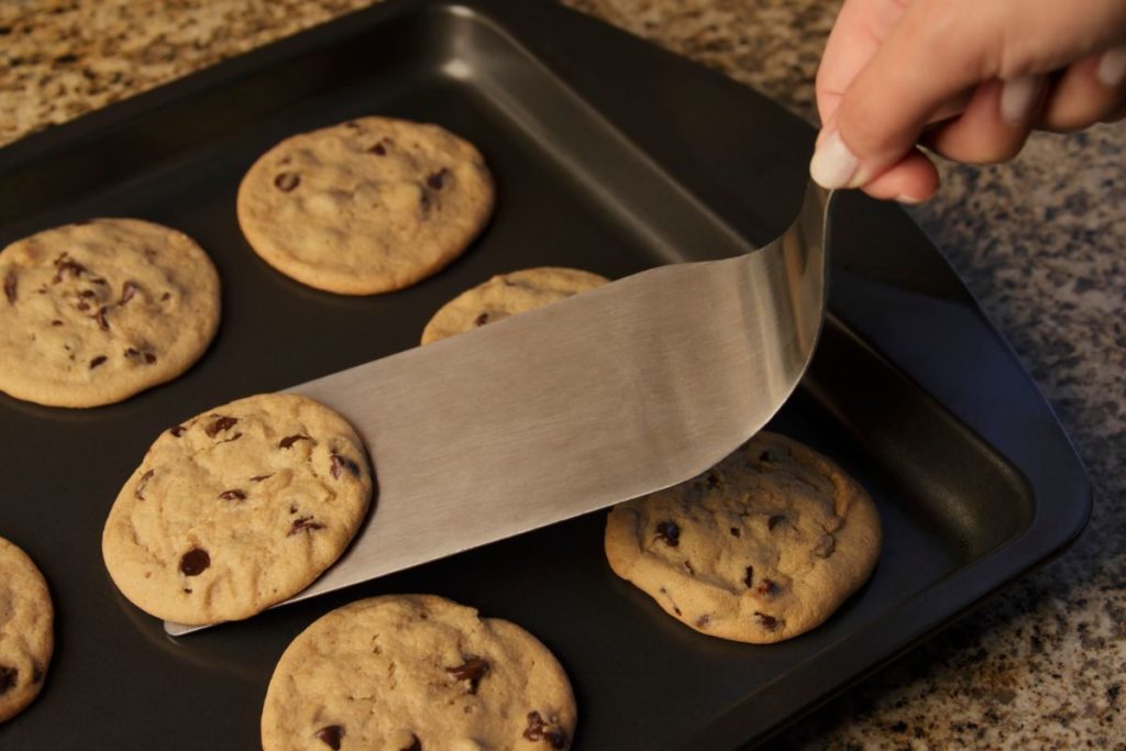 easily removing cookies from a baking sheet
