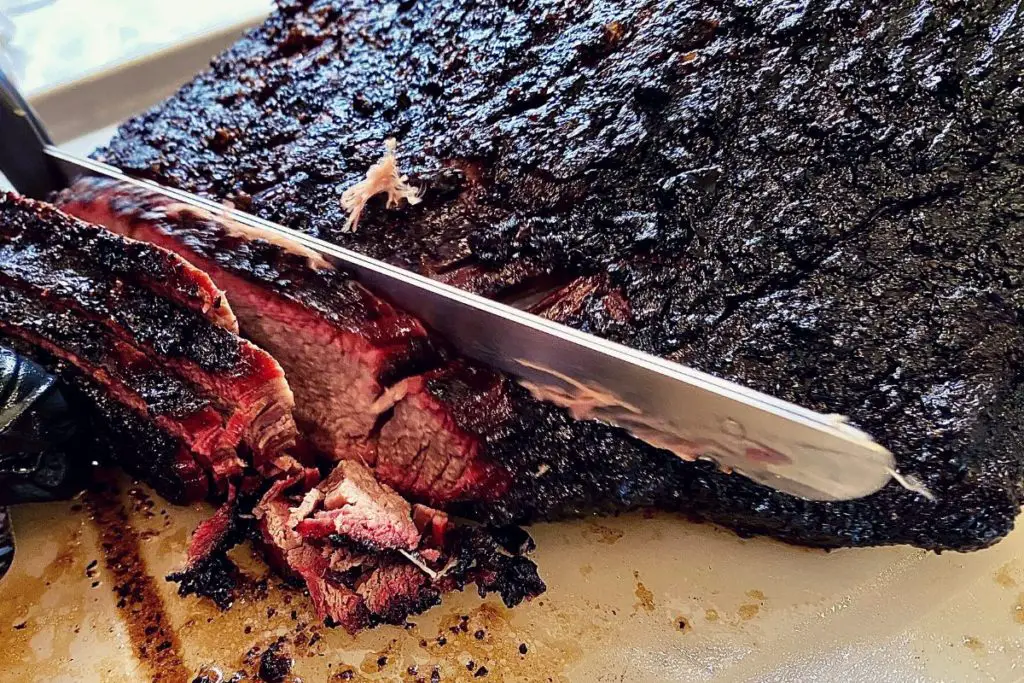 a crispy dark layer of brisket bark