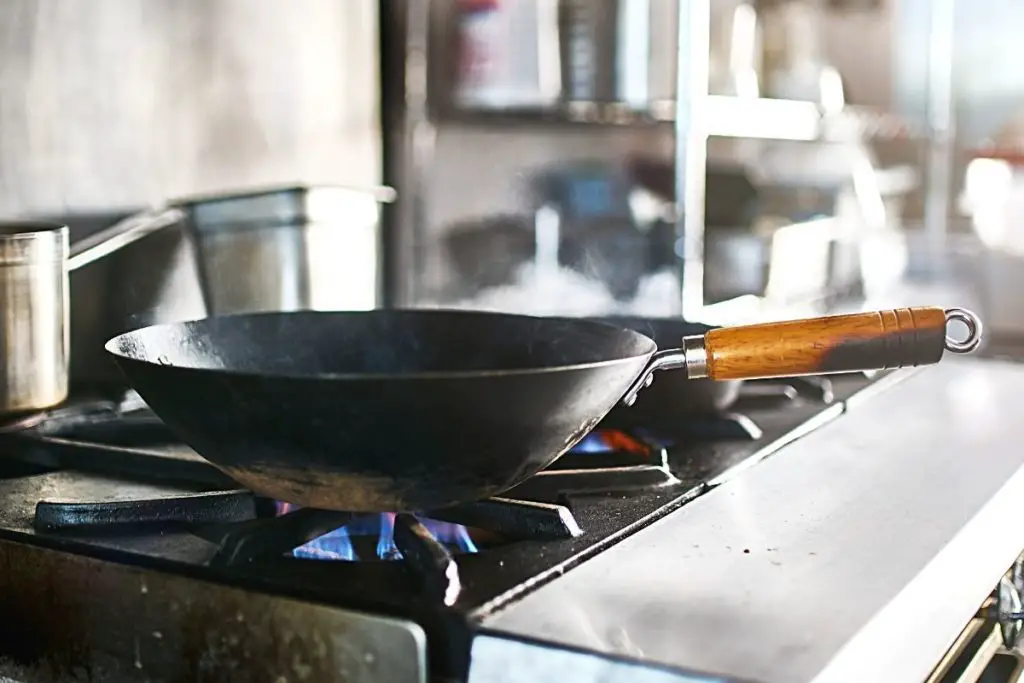 carbon steel wok on the hot hob