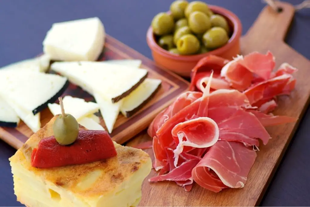 Olives, Jamón Serrano, and Manchego Cheese