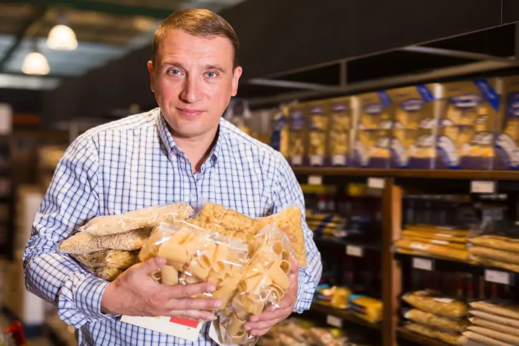 purchasing pasta in a supermarket