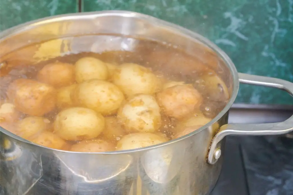 boiling Yukon gold potatoes with skin on