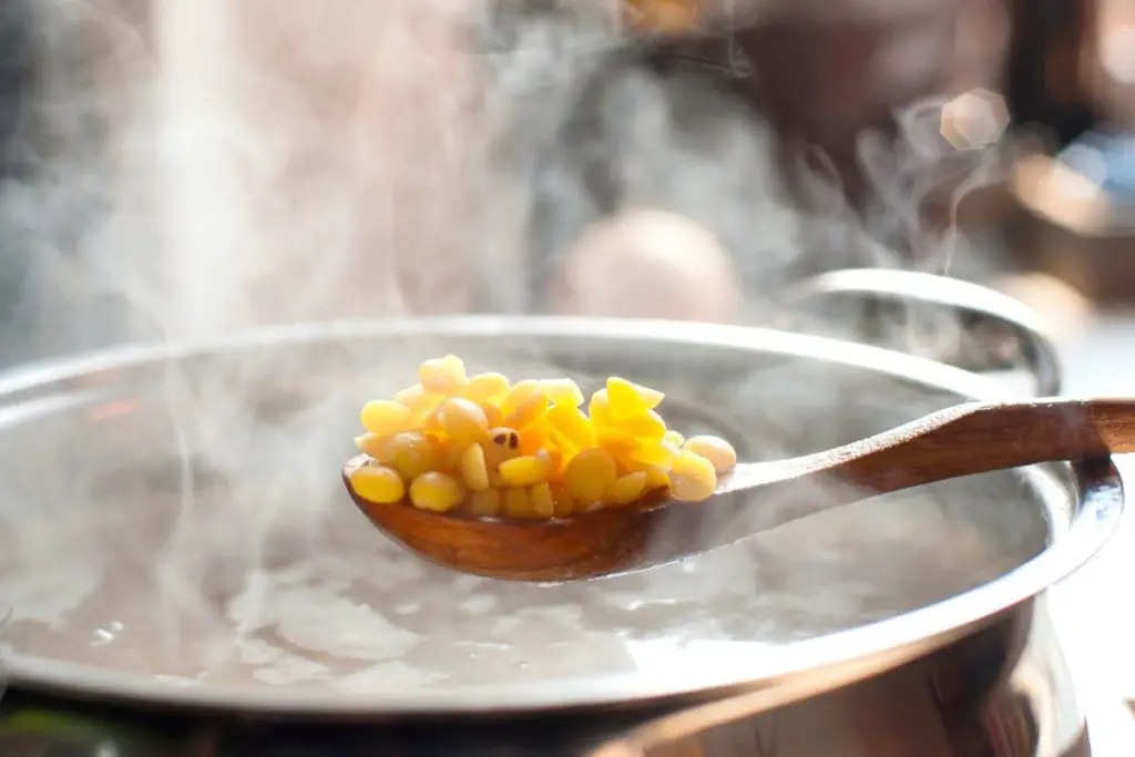 adding yellow split peas to the soup