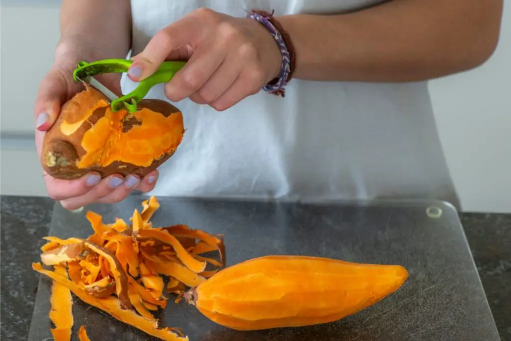 peeling sweet potatoes