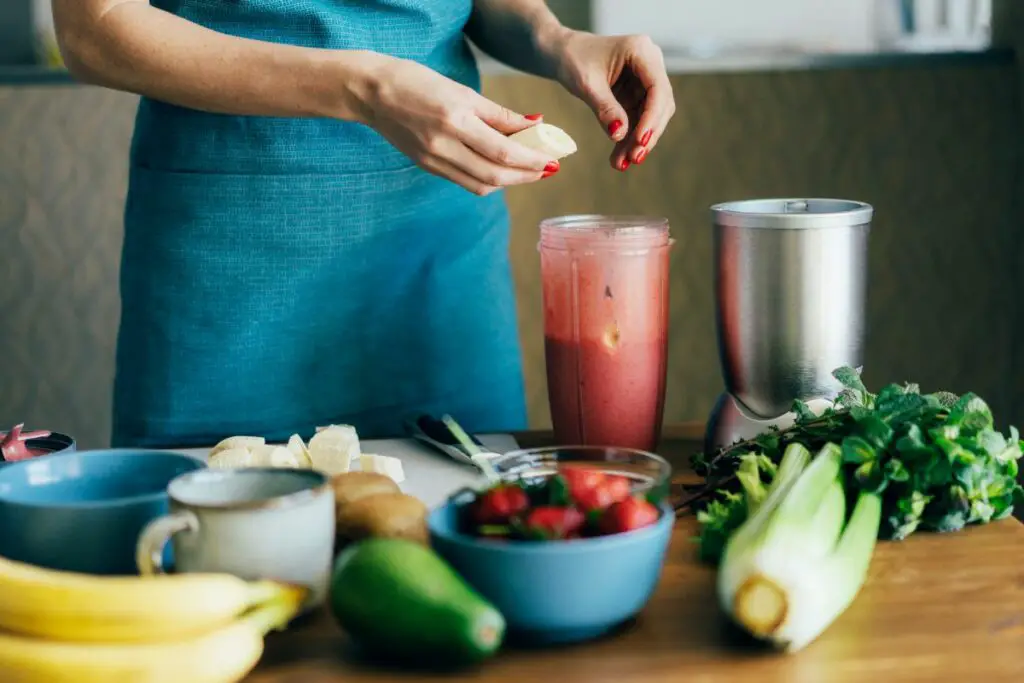 making a large batch of smoothies for freezing up