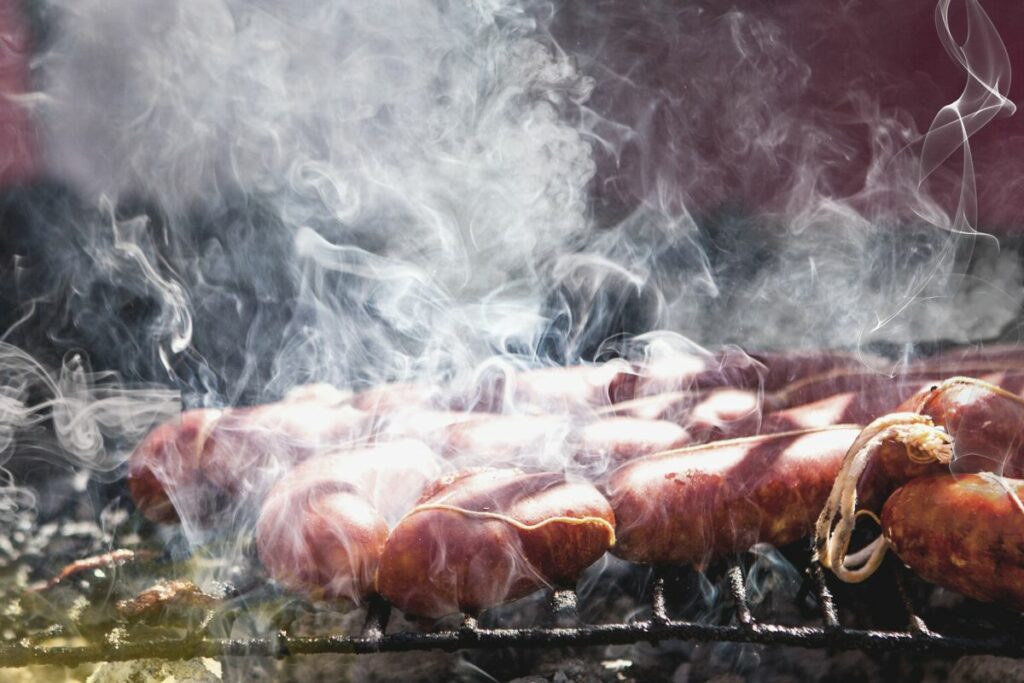 grilling a chorizo sausage