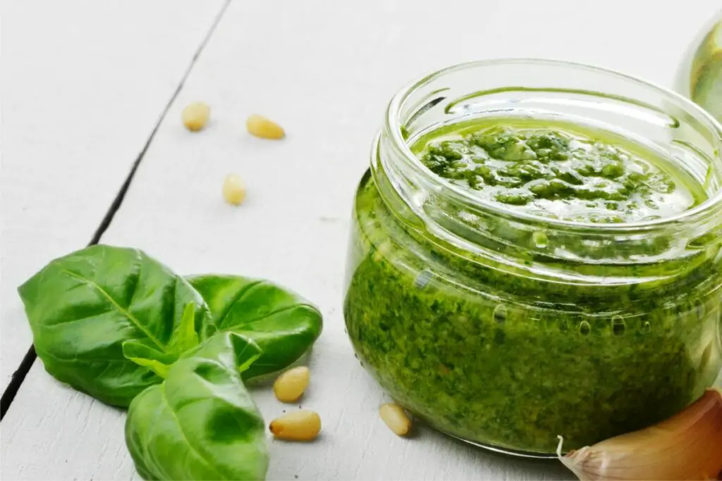 using basil leaves to make pesto