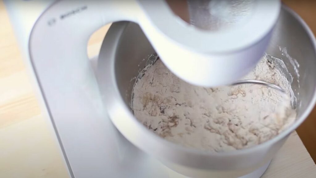mixing in the self-raising flour