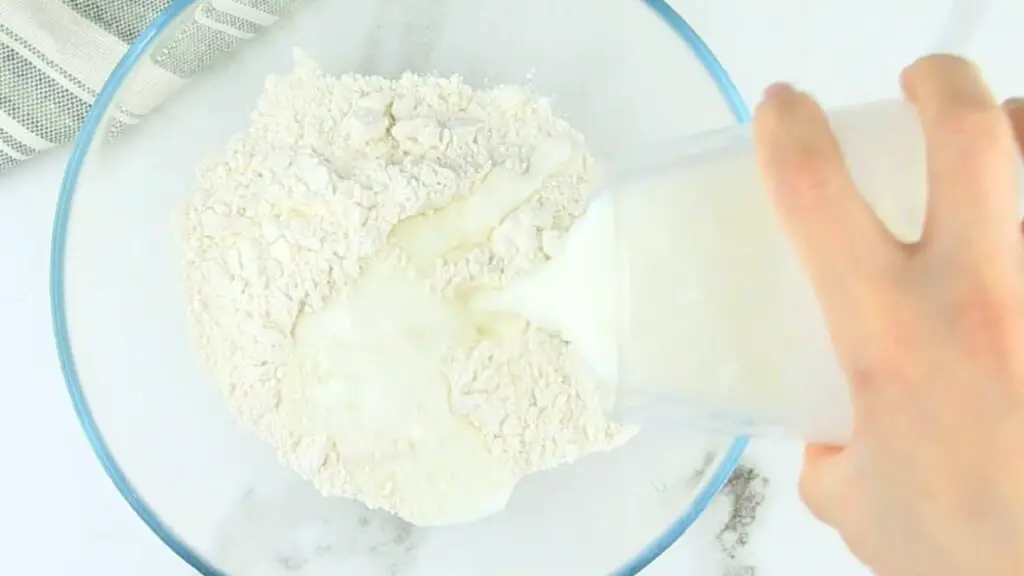 mixing all purpose flour and kefir