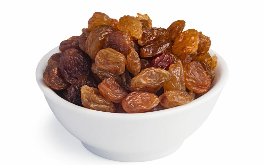 a bowl of raisins that are high in potassium