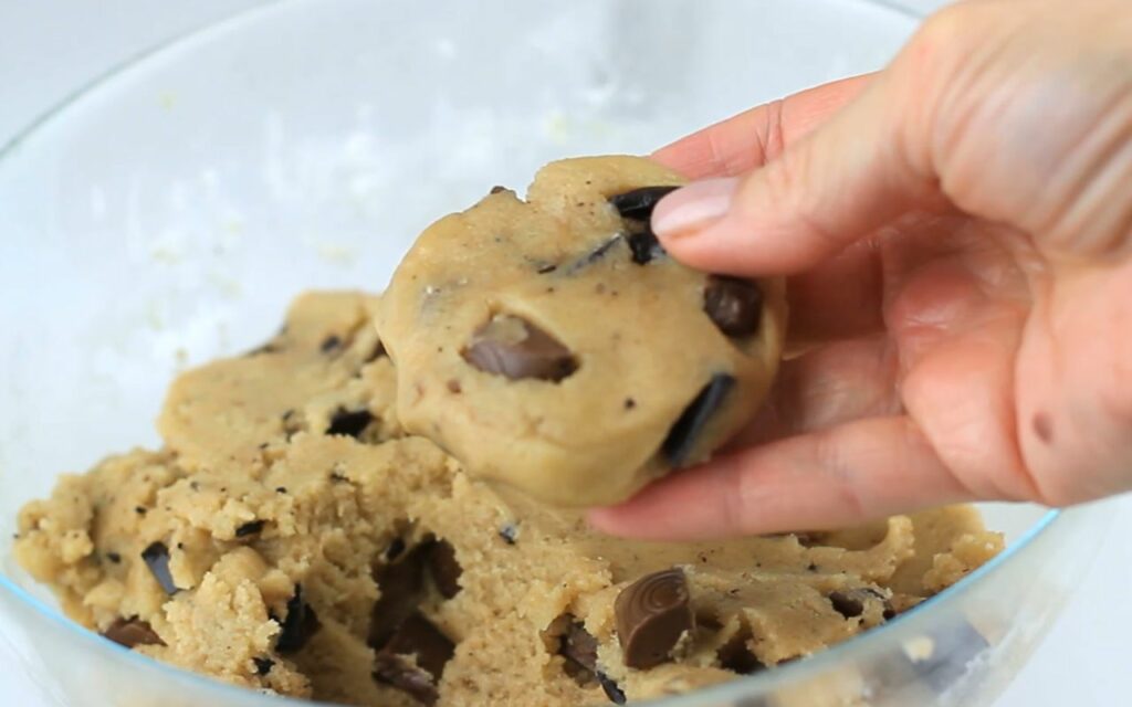 shaping the cookie dough before baking