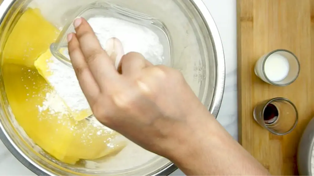 combining the salted butter, powdered sugar, and vanilla extract