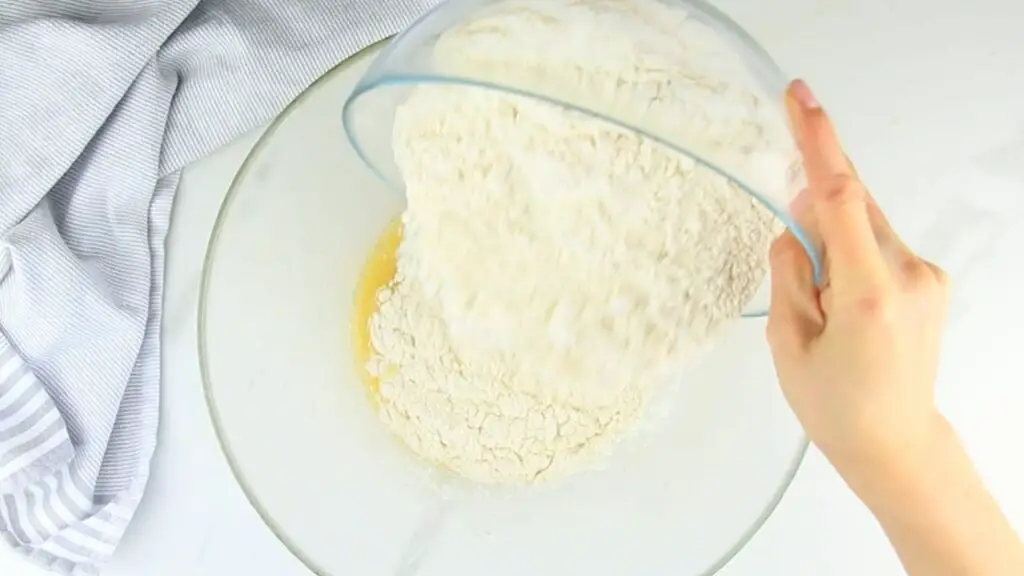 adding 3 and half cups of all-purpose flour