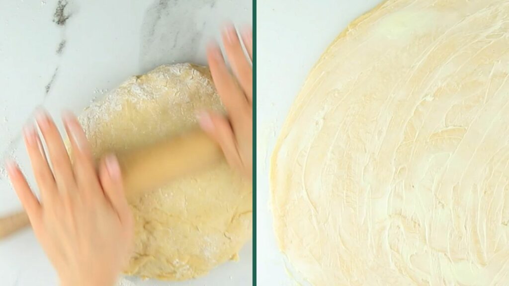 rolling the dough and covering it with butter