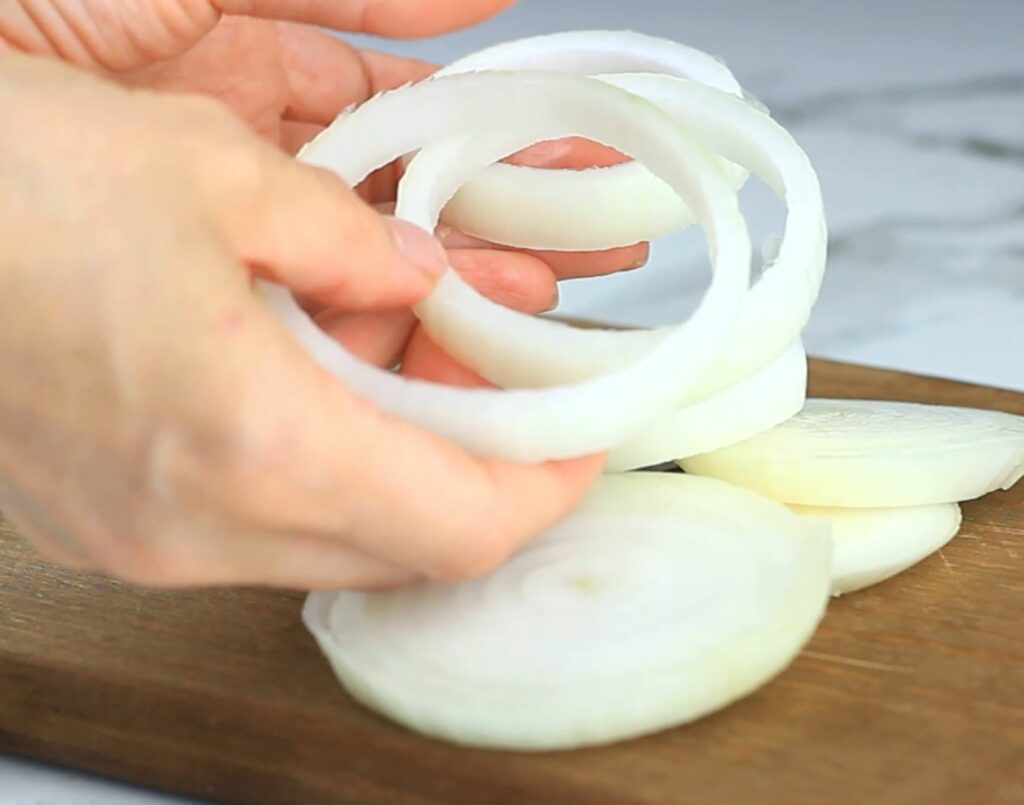 cutting onion into rings