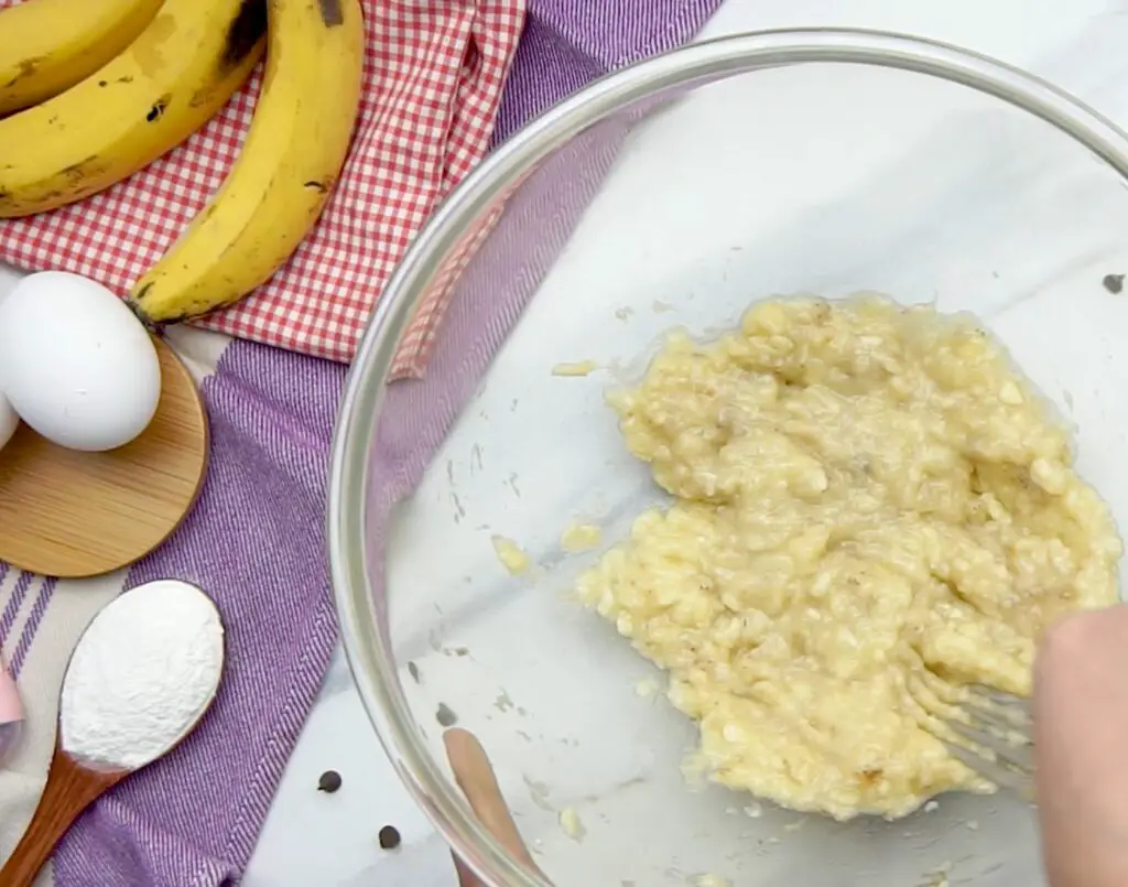 mashing bananas for banana bread