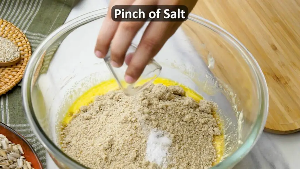 mixing the seed flour and salt together