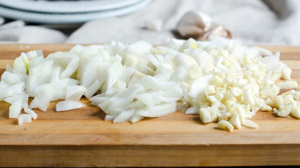 chopped garlic and onions for barley soup