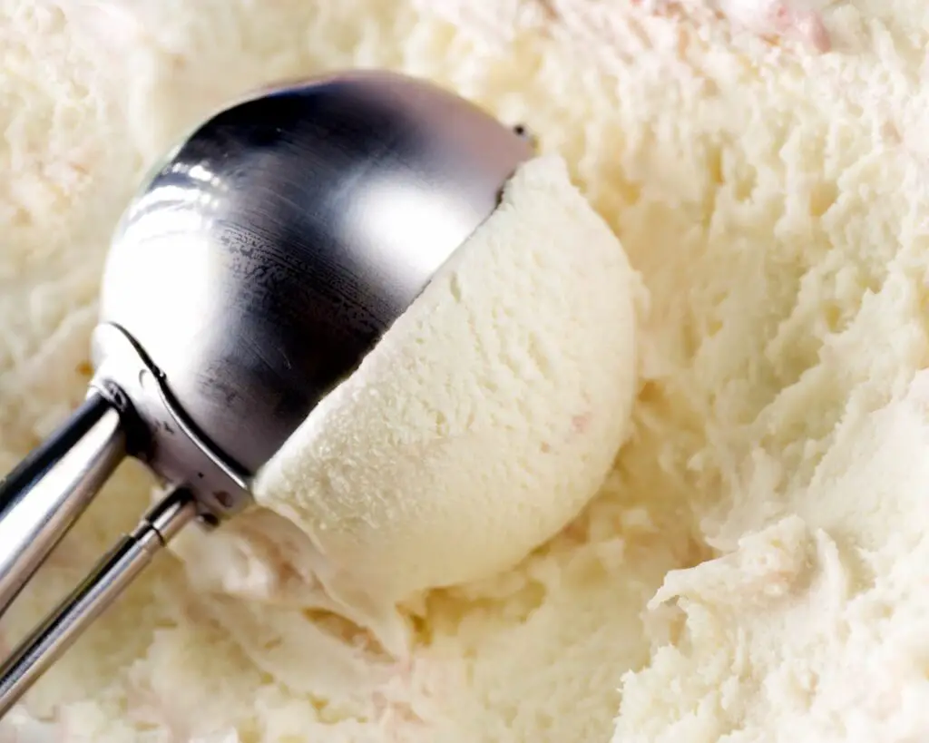 scoop of soft and fluffy vanilla ice cream