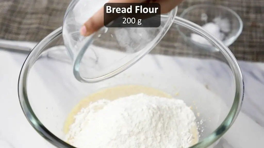 mixing in the bread flour