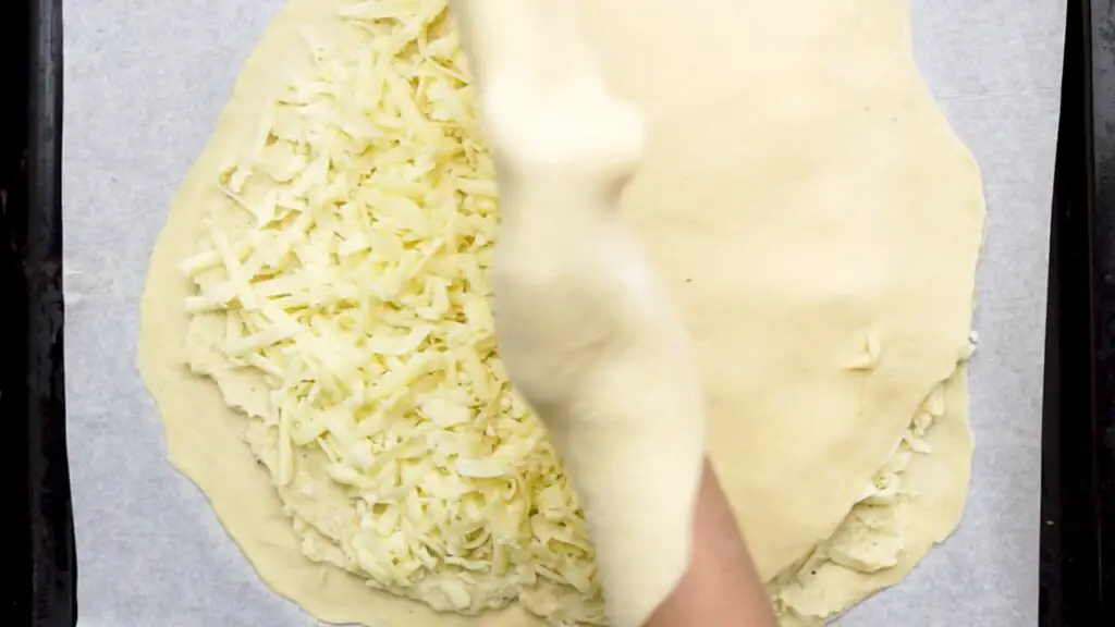 placing the second dough circle on top