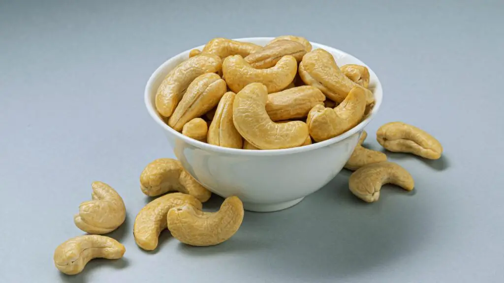 cashew nuts in a white bowl